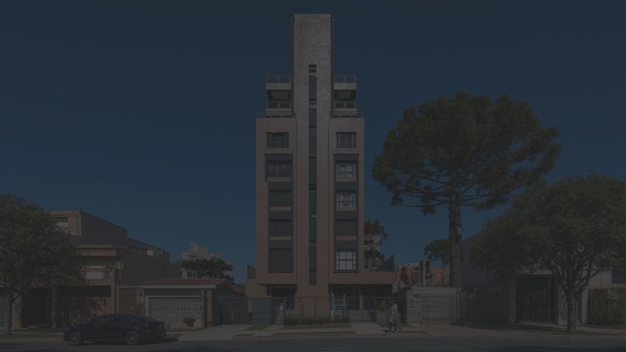 Fachada de edifício residencial com entrada e portaria voltadas para a rua